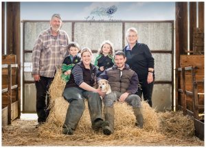 Family portrait in barn Lennox Family Lambing on Loch Lomond This Farming Life Life in Focus Portraits outdoor family photographer Luss Loch Lomond