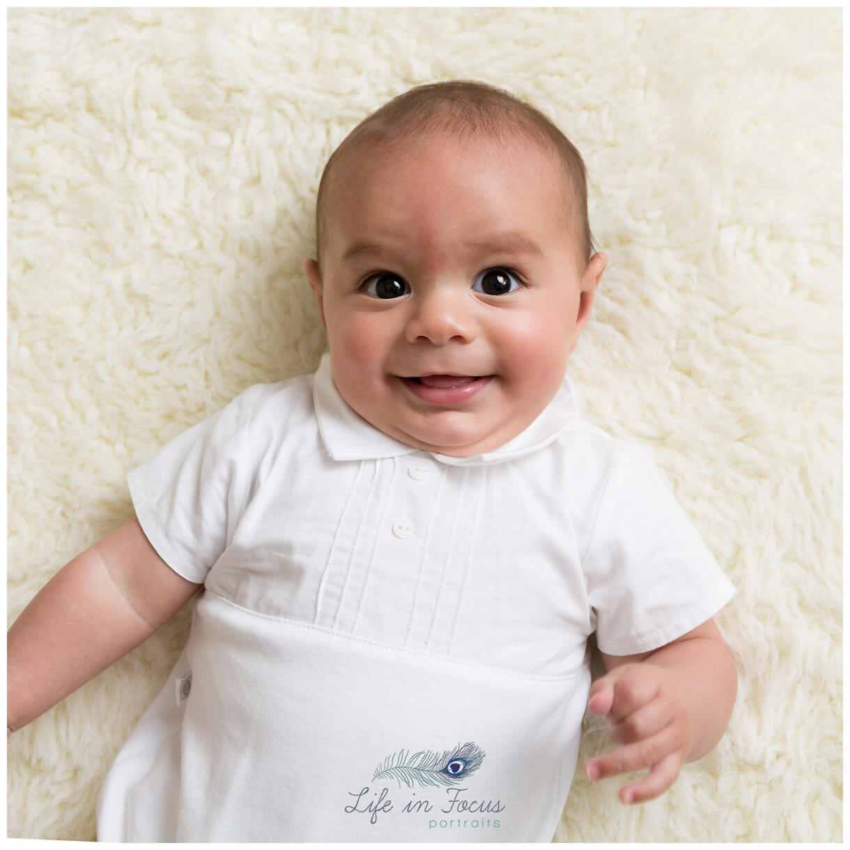 baby boy smiling tummy time baby photoshoots Life in Focus Portraits baby photos Dumbarton Dunbartonshire