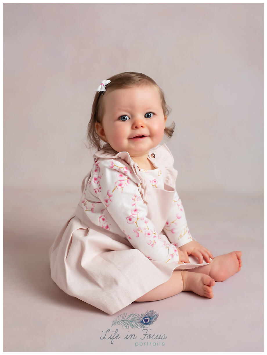 baby girl smiling little sitter photoshoot baby milestones Life in Focus Portraits baby photographer Balloch Alexandria