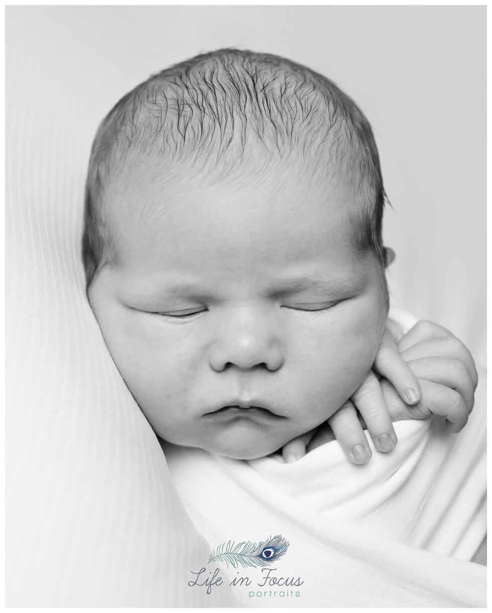 black and white portrait newborn baby on pure white Simply Baby newborn photoshoots Life in Focus Portraits Rhu Helensburgh
