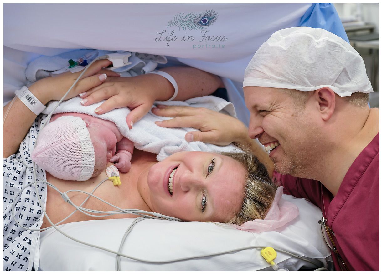 happy smiling new parents cuddle newborn after c-section delivery Life in Focus Portraits birth photographer Royal Alexandra Hospital Paisley