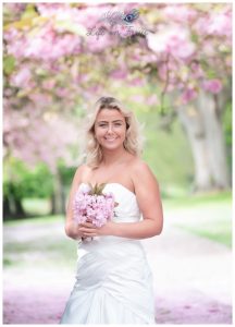 bride under cherry blossom wedding photography Dumbarton West Dunbartonshireng Life in Focus Portraits wedding photography Helensburgh and Loch Lomond