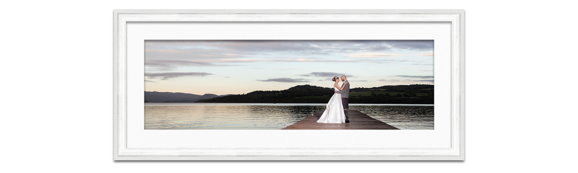 wedding photo newly married husband and wife on pier Duck Bay Hotel Loch Lomond Life in Focus Portraits wedding photographer Helensburgh Luss Argyll and Bute