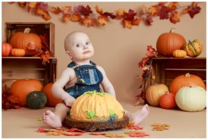 autumn pumpkin themed cake smash Life in Focus Portraits 1st birthday cake smash photography Rhu Helensburgh