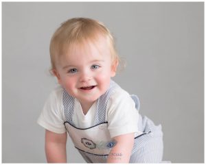 baby boy climbing babys 1st birthday milestone session Life in Focus Portraits baby photographer Rhu Arrochar Tarbet Luss