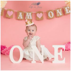 cute photo of baby gorl 1st Birthday photo shoot Rhu Life in Focus Portriats baby photography studio Helensburgh