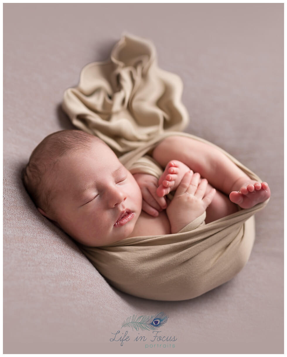 newborn baby wrapped in neutral colours Life in Focus Protraits newborn portrait photographer Cardross Dumbarton