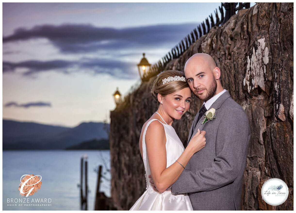 newly married couple wedding day photos at Duck Bay Hotel award winning photo Life in Focus Portraits award winning wedding photographer Loch Lomond