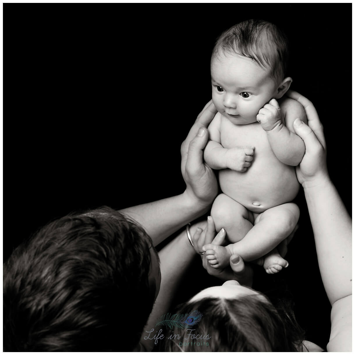 parents with newborn baby Life in Focus Portraits baby photography Balloch Alexandria Luss