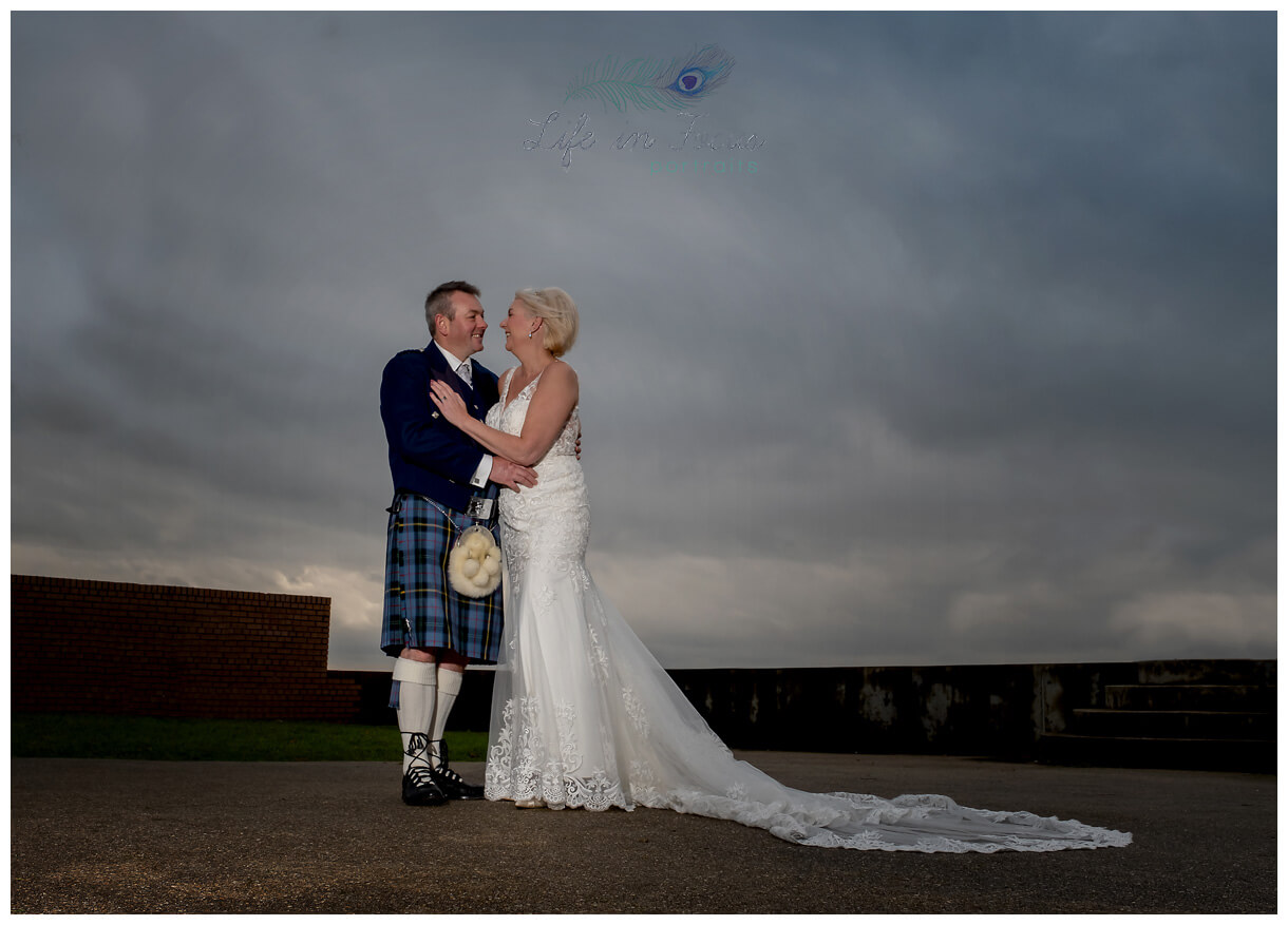 Micro Weddings Helensburgh Registry Office Life in Focus Portraits Loch Lomond Wedding PHotographer photo of Bride and Groom outside Helensburgh Civic Centre Secret Elopement Wedding